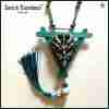 talisman magic amulet necklace pendant dragon dungeons head evil eye demon bib